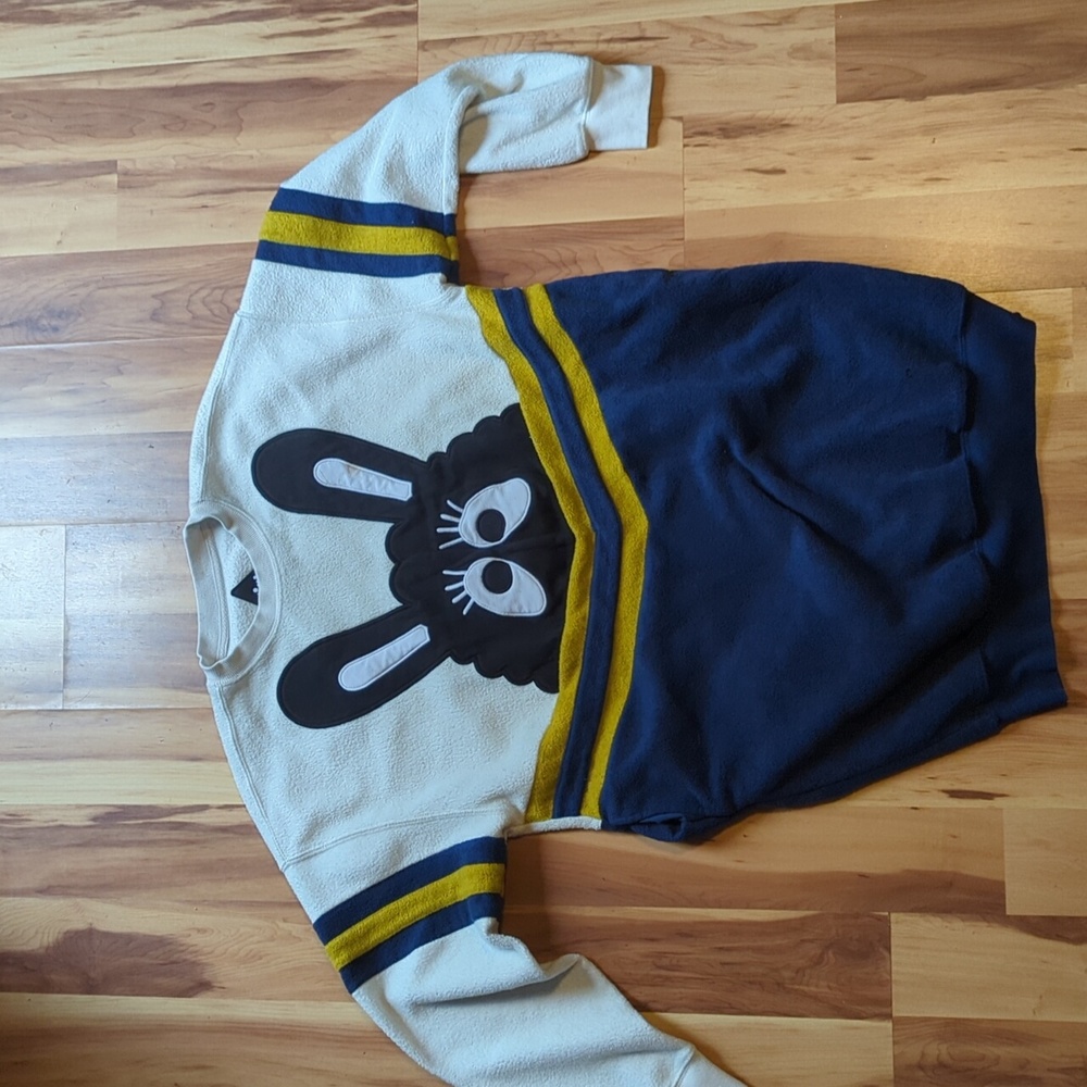 Oversized sweater with googly eye rabbit